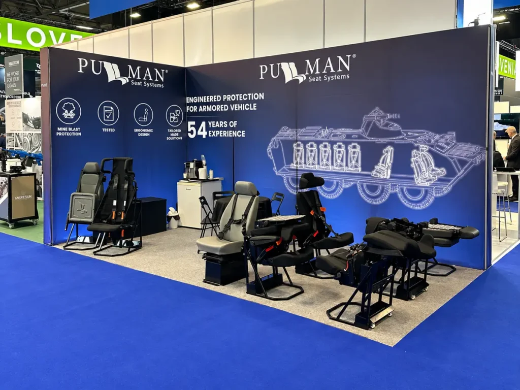 Pullman Seat Systems stand displaying MRAP armored vehicle seats at Eurosatory 2026